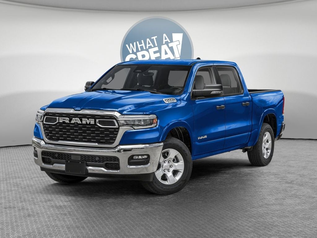 2026 RAM 1500 RAM 1500 BIG HORN CREW CAB 4X4 5'7' BOX in Hydro Blue Pearl-Coat Exterior Paint — front three-quarter view