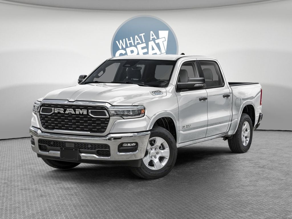 2026 RAM 1500 RAM 1500 BIG HORN CREW CAB 4X4 5'7' BOX in Bright White Clear-Coat Exterior Paint — front three-quarter view