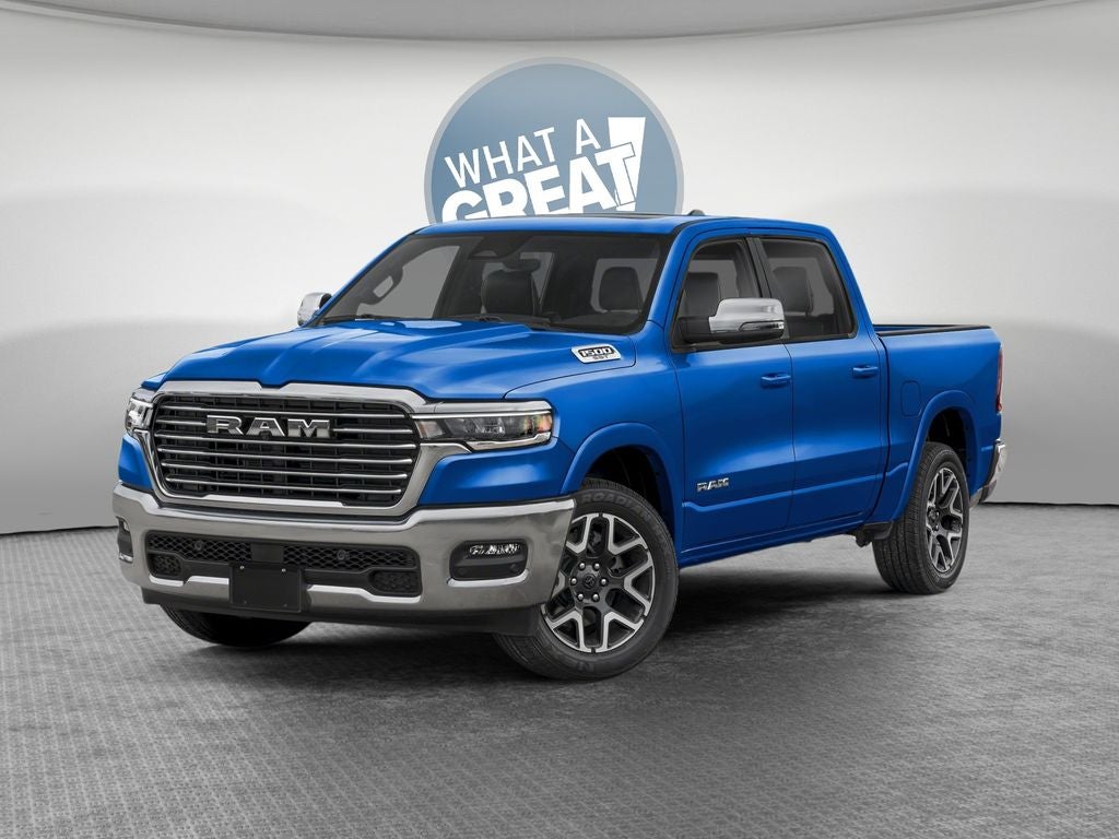 2026 RAM 1500 RAM 1500 LARAMIE CREW CAB 4X4 5'7' BOX in Hydro Blue Pearl-Coat Exterior Paint — front three-quarter view