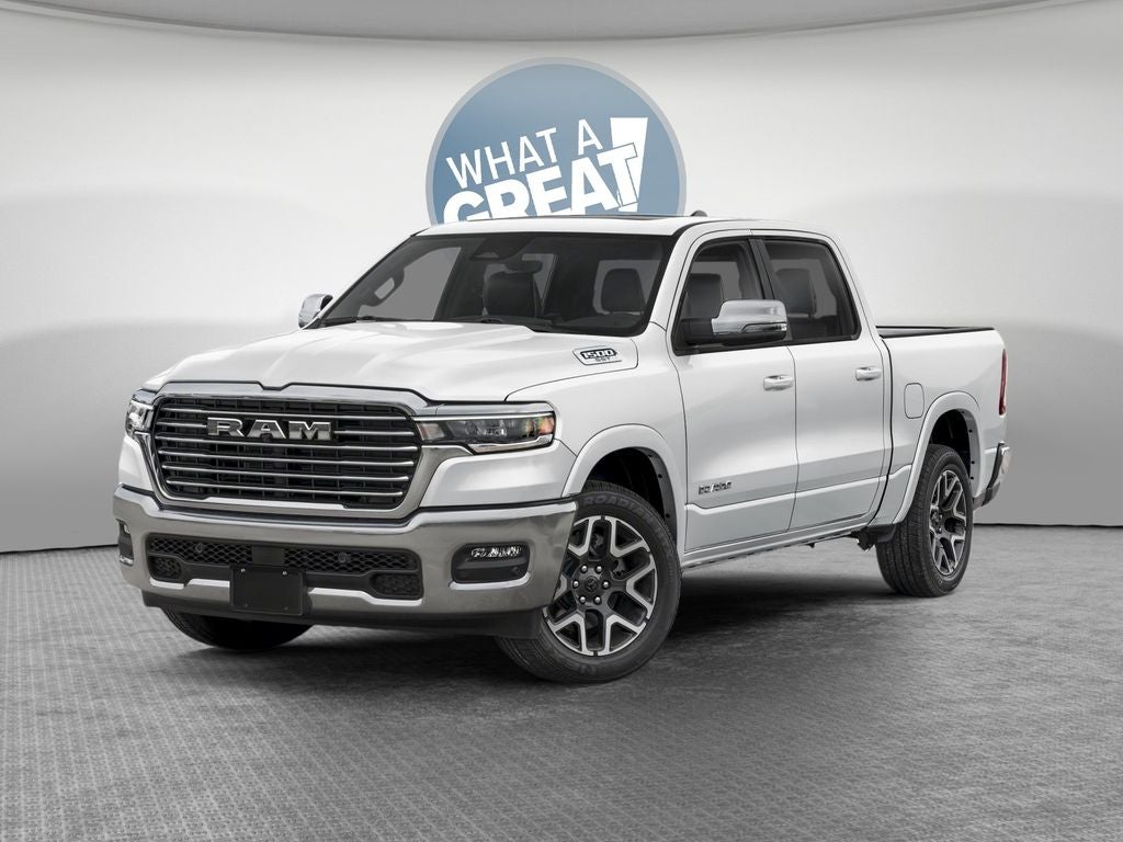 2026 RAM 1500 RAM 1500 LARAMIE CREW CAB 4X4 5'7' BOX in Bright White Clear-Coat Exterior Paint — front three-quarter view