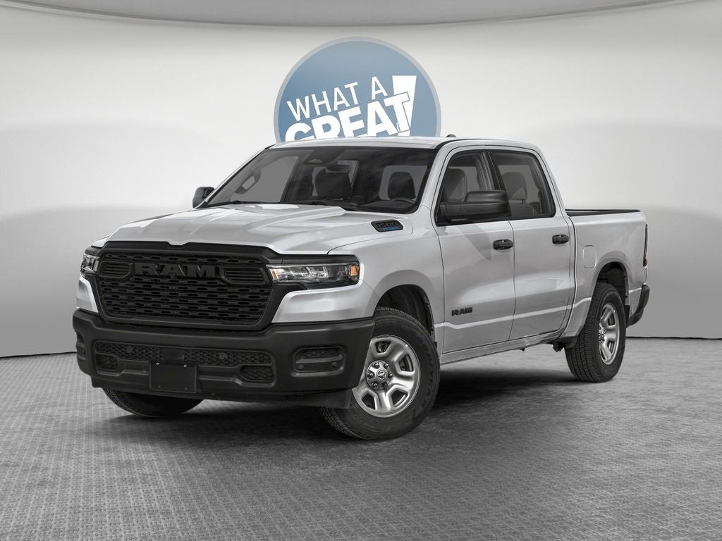 2026 RAM 1500 RAM 1500 EXPRESS CREW CAB 4X4 5'7' BOX in Silver Zynith Exterior Paint — front three-quarter view